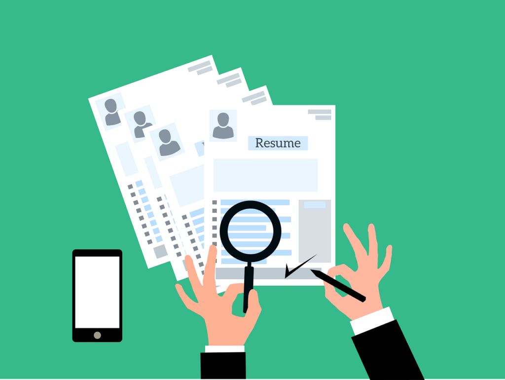 Illustration showing hands reviewing multiple résumé documents labeled “Resume,” with a magnifying glass highlighting text and a pen indicating selection. A smartphone appears on the left, suggesting applicant screening or résumé review in a hiring or recruitment process.