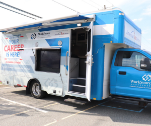 WorkSource Montgomery's mobile job center vehicle parked in parking lot