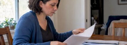 Employee reviewing records before filing a charge