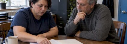 Employee and union representative review an agreement